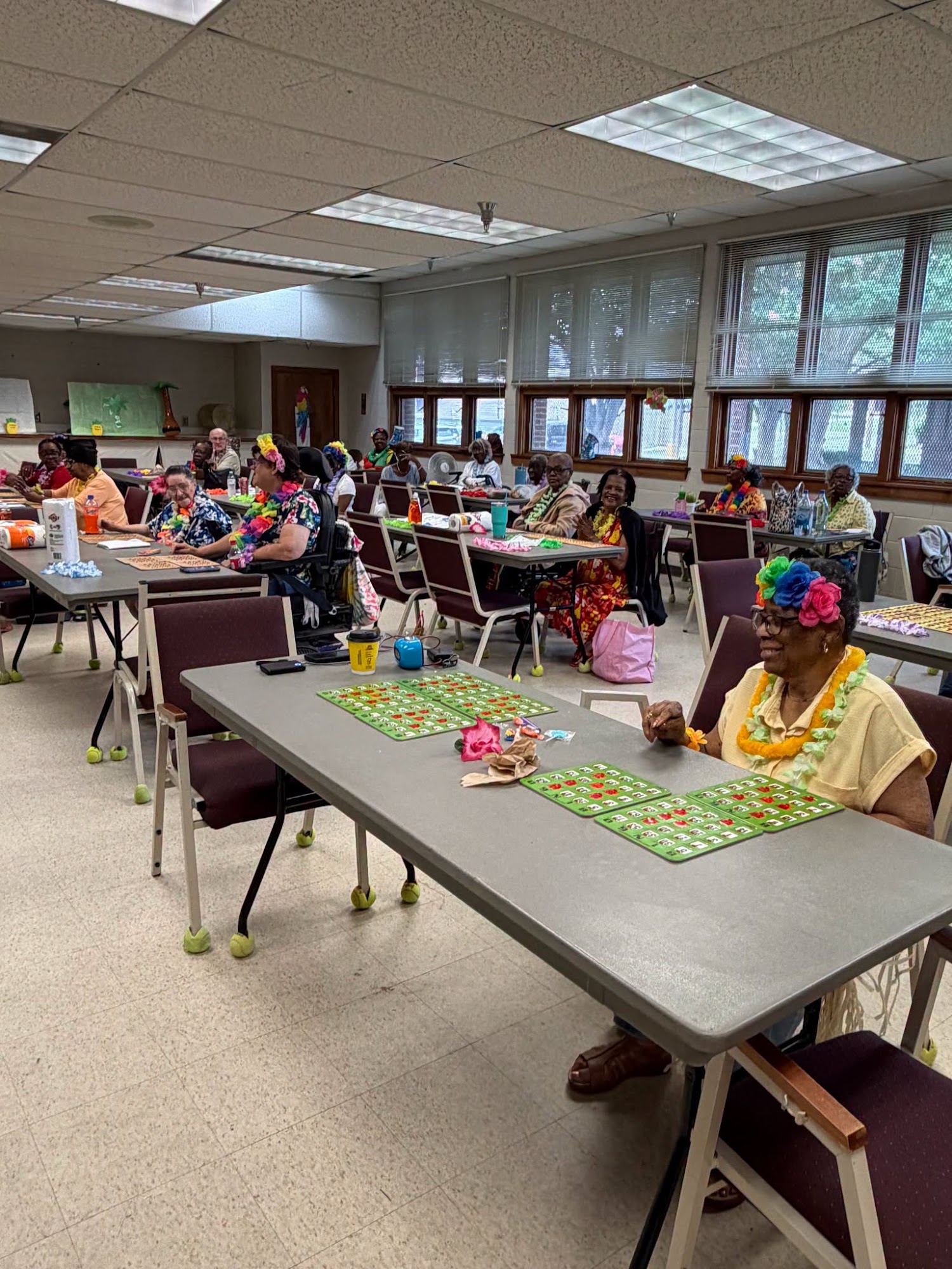 Community members at an activity table, featured on the Parker’s Place Find Resources page